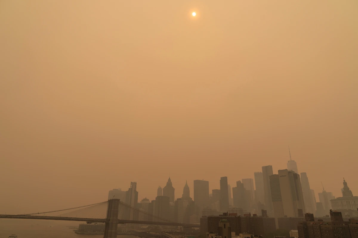 Faint skyline of buildings visible through smog